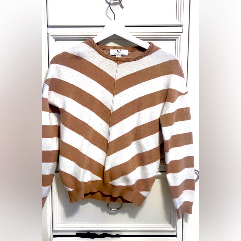 Magaschoni XS sweater thing- it’s pretty short but y’all skinny queens will love